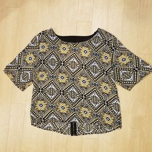 UMGEE yellow kaleidoscope print crop top.